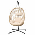 Sedia sospesa in rattan con struttura in metallo Beige